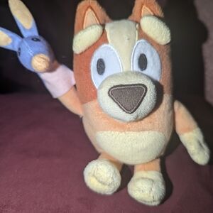 Orange and Cream Plush Toy